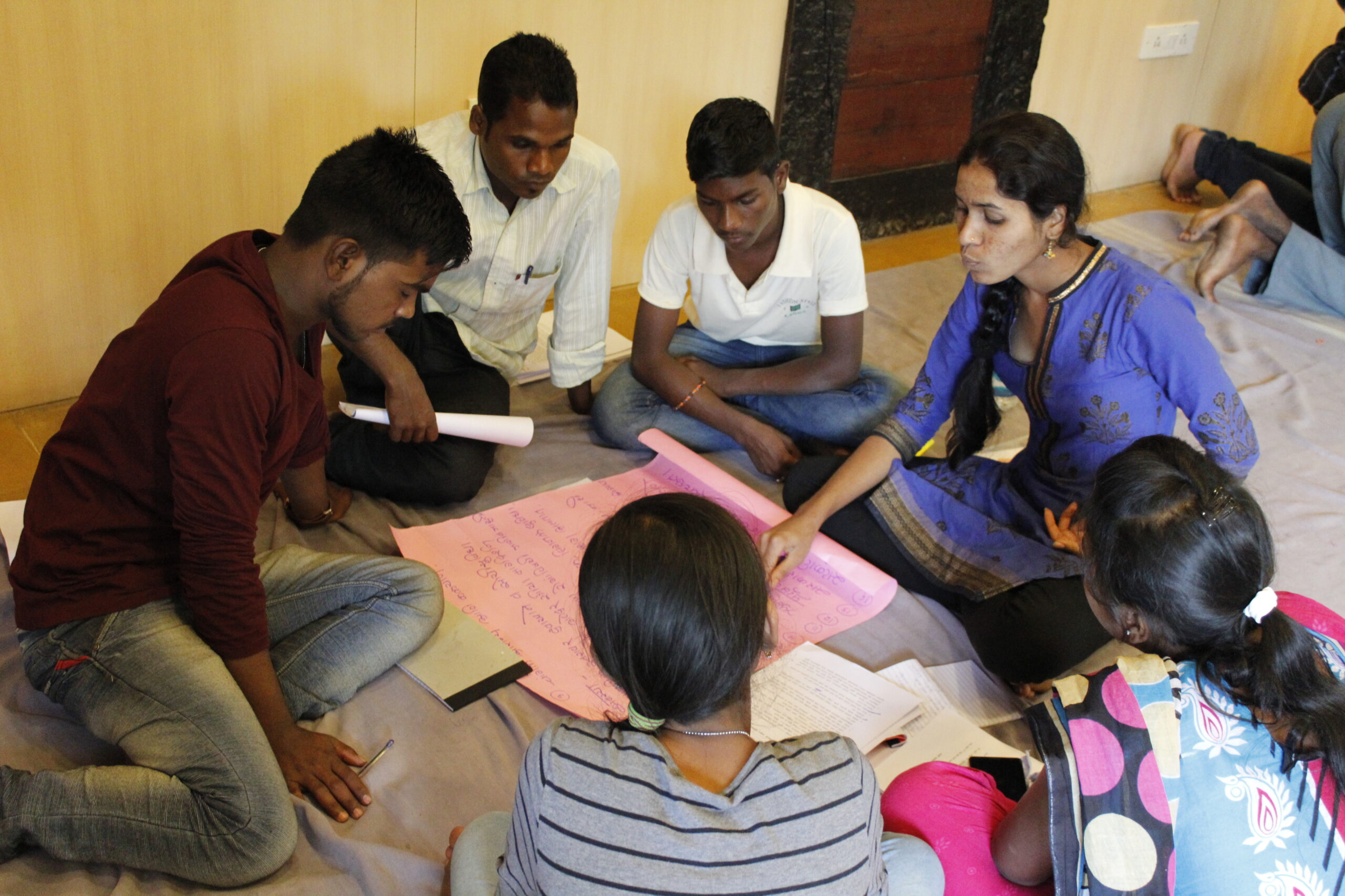 Youth engaged in discussion | Vision - YUVA